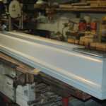 Crown moulding fabrication for door assembly detail.