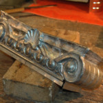 Ionic scroll capital fabrication completed.