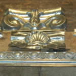 Ionic scroll capital showing all parts for assembly.